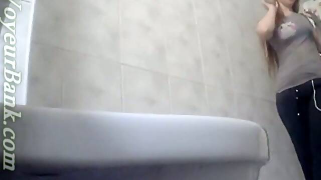 Lovely young white chick got to pee and didnt see the camera