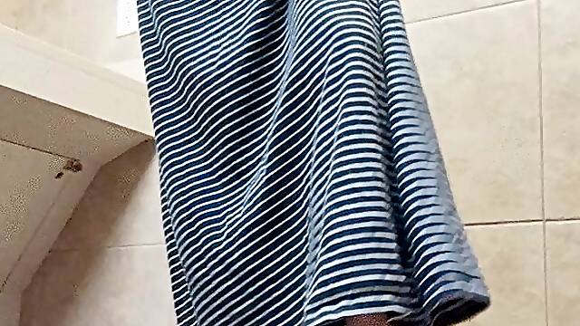 Peekaboo calves in airport restroom